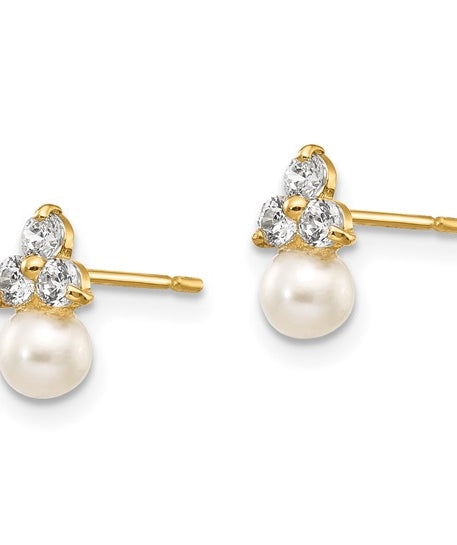 Diamond Essence Round Brilliant stone 0.10 ct each, set in group of three in floral arrangement and round freshwater cultured pearl makes a perfect post earrings for little ears. 0.60 cts.t.w. set in 14K Solid Yellow Gold.