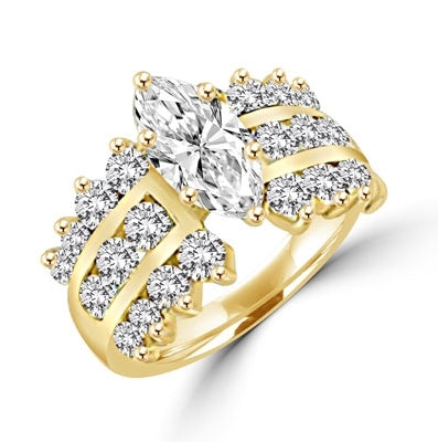 FLASH DANCE- Ever classic 14K Solid Gold ring, 3.40 cts.t.w. in all, with 2.0 cts. t.w. marquise cut Diamond Essence center stone and three rows of channel set round Diamond Essence piece on each side. A virtuoso event.