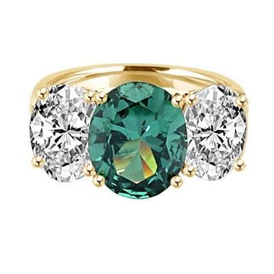 Three stone Jaw dropping oval Emerald stone ring