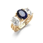 Ovalinas - Three Stone Oval Ring with 2 Ct. Oval Masterpiece on an Ethnic Band and 1.5 Ct.Oval Essence on each side, 5 ct t.w. in 14K Solid Gold. Center Stone changeable to Many Options.
