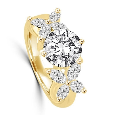 Unusual Ring with a 2.0 Ct. Round Brilliant cut Diamond Essence center stone supported by a vibrant "X" on each side with 8 Marquise Cut Masterpieces. 3.2 Cts. T.W, in 14K Solid Gold.
