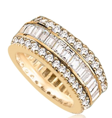 Private Pleasures - Wide Band Ring with a beautiful triple spin! Three heavenly rows of Diamond Essence Masterpieces. In the center, intimately touching channel set baguettes, and on both sides, round cut melee pieces. 5 Cts. T.W, in 14K Solid Gold.
