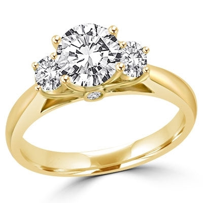 Ring 3 round stones 1 ct in center and 0.20 ct on sides