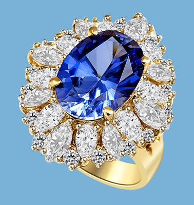Medley Magic - Artistically set mixture of Marquise cut, Pear cut and Round cut Diamond Essences around 6.0 Cts. Oval cut Sapphire Essence in center. Perfect for Party. 10.0 Cts T.W. set in 14K Solid Yellow Gold.