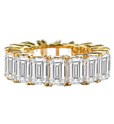 Diamond Essence Bestselling eternity band with all-round sparkle of emerald cut brilliant stones. 9 Cts. T.W. set in 14K Solid Yellow Gold.