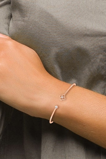 14K rose gold flexible cuff bangle with diamond essence lab grown round diamond in bezel and prong setting