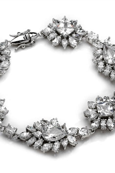 Diamond Essence Party wear Bracelet, 30 Cts.T.W with beautiful creation of Brilliant Pear,Princess,Marquise and Oval Stones, in Platinum Plated Sterling Silver.