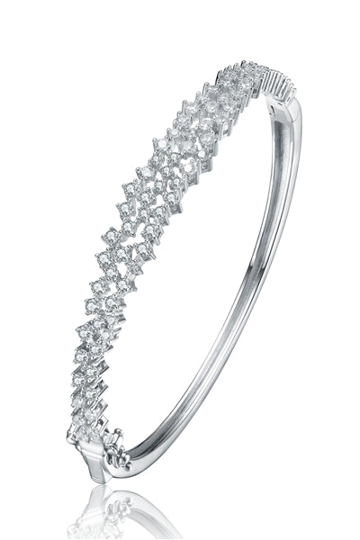 Diamond Essence Hinged Bangle Bracelet in Prong Settings. 3.25 Cts.t.w. in Platinum Plated Sterling Silver. Shine your Holidays with this beautiful piece.