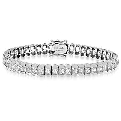 Platinum Plated Sterling Silver bracelet, 7" long, encompasses Diamond Essence Princess cut stones. 7.0 cts.t.w.