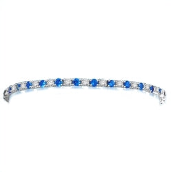 Diamond Essence Sapphire-and-Diamond Tennis Bracelet--7" tennis bracelet alternates round-cut Sapphire Essence and Diamond Essence jewels.5.0 Cts. T.W. set in Platinum Plated Sterling Silver.