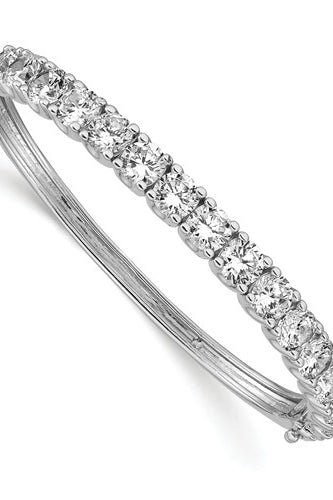 Diamond Essence Hinged Bangle Bracelet in Prong Settings. 15.0 Cts..t.w. in Platinum Plated Sterling Silver. Shine your Holidays with this beautiful piece.