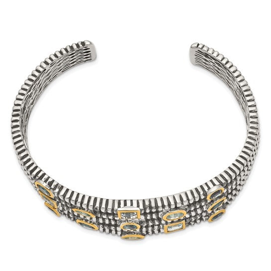 Wide cuff bracelet with diamond essence sky blue and london topaz stones in bezel setting