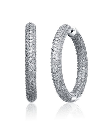 In and Out hoop earrings,artistically crafted in Platinum Plated Sterling Silver with special press on lock. Diamond Essence melee set in prongs for classic sparkle. 9.0 cts.t.w. ( 1 &1/2").