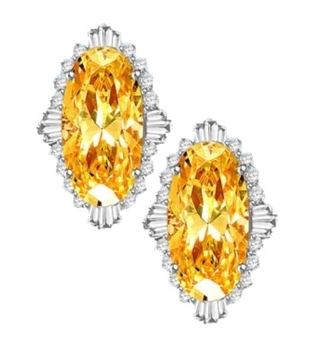 Diamond Essence Earrings in Platinum Plated Sterling Silver with Diamond essence 9.0 cts. Canary stone in the center and encircled by round stones and a large spray of baguettes on all four sides. Wear it with confidence. Appx. 21.0 cts. t.w.