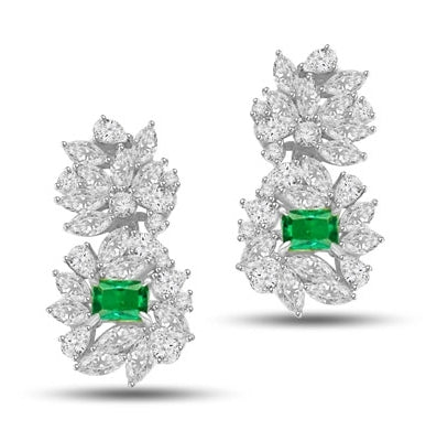 Designer earrings, just perfect for special occasions. Diamond Essence Emerald cut Emerald Essence, 1 ct. stone set in four prongs and surrounded by Marquise, Pear and Round Brilliant Essence stones in artistic floral design.