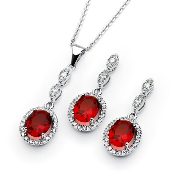 A marvelous pair of the four-prong set designer earring-pendant duo for women with oval-cut Ruby Diamond by Diamond Essence set in platinum-plated sterling silver. 5.0 Cts.t.w.