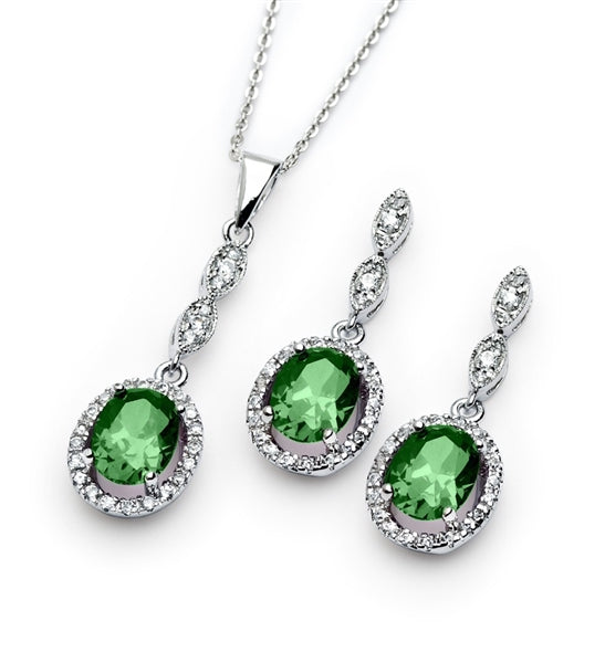 A marvelous pair of the four-prong set designer earring-pendant duo for women with oval-cut Emerald Diamond by Diamond Essence set in platinum-plated sterling silver. 5.0 Cts.t.w.
