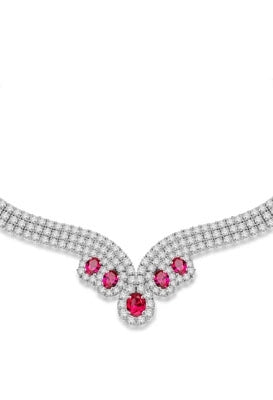 Magnificent Ruby Necklace. 3.0 Cts. Oval cut Ruby Essence in the center and 1.50 Cts. each Ruby Essence encircled by Diamond Essence stones. making 3 rows all around neckline. Special lock- on clasp to secure it. Just perfect to make any day a special day