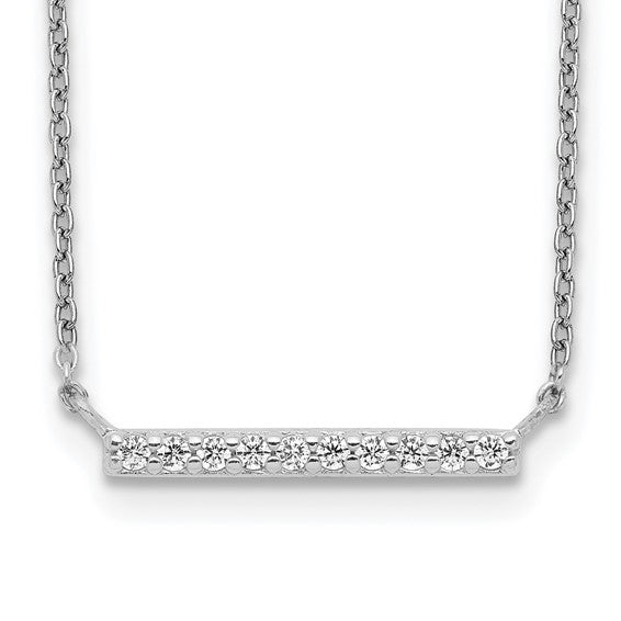 Beautiful and delicate bar necklace with simulated round brilliant diamond essence stones set in platinum plated sterling silver, 0.5 cts.t.w. Dazzle with this delicate sparkle in your neck all day long.