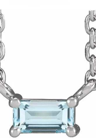 Women's single artificial blue topaz straight baguette necklace by Diamond Essence set in platinum plated sterling silver. 0.25 Cts. t.w.