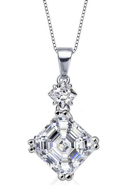 Diamond Essence Pendant With Asscher Stone And Princess Stone in Platinum Plated Sterling Silver.
Length Of Pendant is 21.5 mm and Width is 9.5mm.