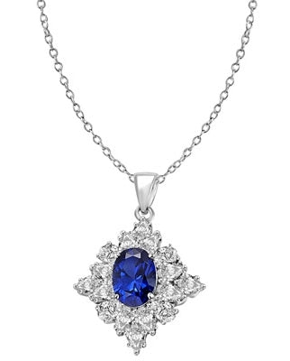 Prong Set Designer Pendant with Artificial Oval Cut Sapphire Center and Pear Cut Brilliant Diamonds by Diamond Essence set in Sterling Silver