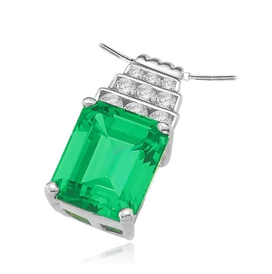 Silver pendant-emerald & melee stone with 4 prongs