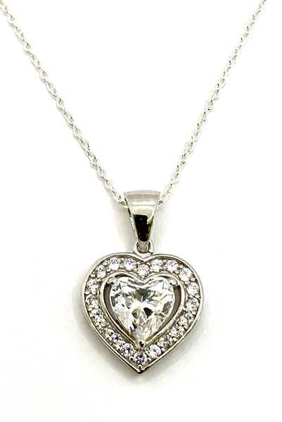 Diamond White Essence stone in prong setting, is surrounded by round brilliant Diamond Essence stones, making another heart. 2.5 cts.t.w. in Platinum Plated Sterling Silver.