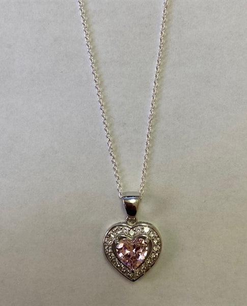 Heart shape Pink Essence stone in prong setting, is surrounded by round brilliant Diamond Essence stones, making another heart. 2.5 cts.t.w. in Platinum Plated Sterling Silver.