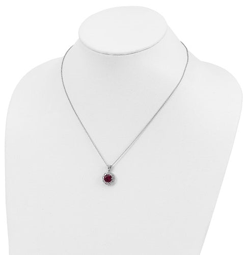 Diamond and Ruby Pendant - 2.0 cts. Round Ruby Essence in center surrounded by princess Cut Diamond Essence and Melee. 5.5 Cts. T.W. set in Platinum Plated Sterling Silver.