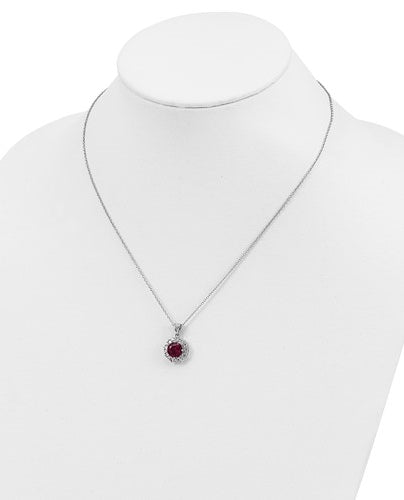 Diamond and Ruby Pendant - 2.0 cts. Round Ruby Essence in center surrounded by princess Cut Diamond Essence and Melee. 5.5 Cts. T.W. set in Platinum Plated Sterling Silver.