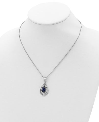 A marvelous prong set designer pendant for women with simulated 2.0 Cts. marquise cut sapphire center surrounded by a brilliant melee diamonds by Diamond Essence set in platinum plated sterling silver. 2.50 Cts.t.w.