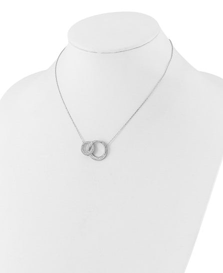 Interlocking circles with Diamond essence round brilliant stones in silver necklace.