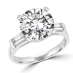 Sterling silver ring with 3 ct stone in center & baguettes