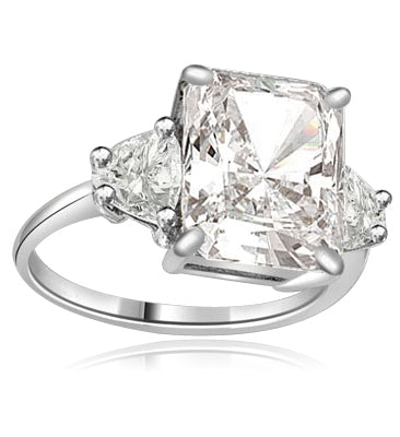 Diamond Essence emerald-cut brilliant stone of 5.0 cts. setting with trilliant baguette on each side. 6 cts.T.W. set in Platinum Plated Sterling Silver.