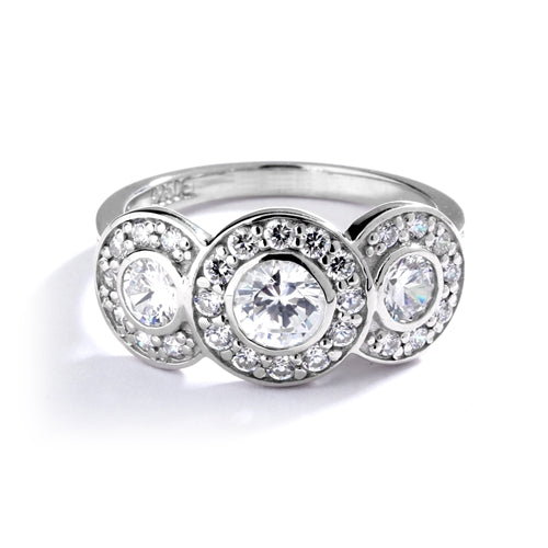 Three stone ring with surrounded melee,1.35 cts. t.w. in Platinum plated Sterling silver
