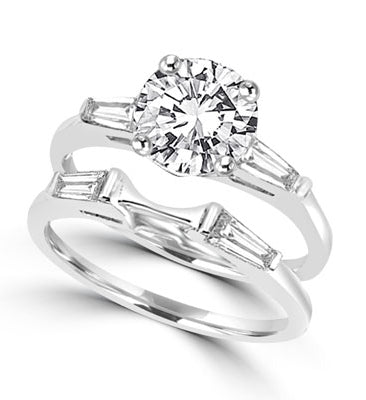round stones and baguettes with 'c' curve in silver ring