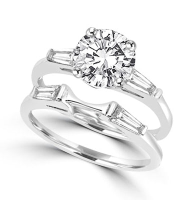 round stones and baguettes with 'c' curve in silver ring