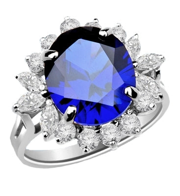 Amazingly beautiful Ring with White Brilliant Marquise and Round accents surrounding a 5 Ct. Blue Star Sapphire Cabochan Center, set in Platinum Plated Sterling Silver, which in light will revel a Star! .