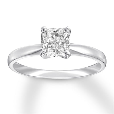 Platinum plated sterling silver ring with cushion cut stone