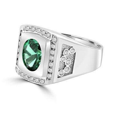 Bezel Set Two-Tone Ring with Simulated Oval Cut Emerald Diamond and Brilliant Melee by Diamond Essence set in Sterling Silver