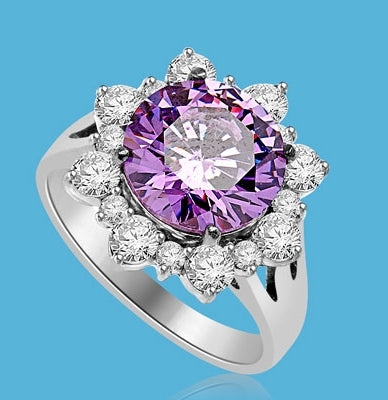 Designer Ring with Round Amethyst Essence in center surrounded by Round Brilliant Diamond Essence and Melee. 4.5 Cts. T.W. set in Platinum Plated Sterling Silver.