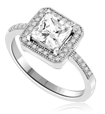 Princess cut Diamond Essence centerpiece,surrounded by Round Brilliant Melee in this pretty Engagement Ring. 2.0 Cts. T.W. set in Platinum Plated Sterling Silver.