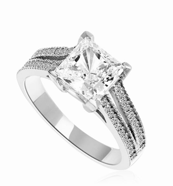 Diamond Essence Ring with Princess in Center accompanied by two rows of melee on each side. 3.25 Cts T.W. set in Platinum Plated Sterling Silver.