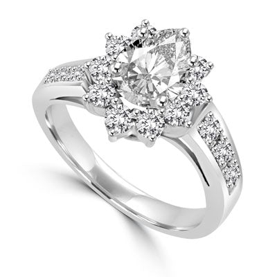 Wide Band Flower Ring sparkles with 1.5 Cts. Oval Center and Round Brilliant Accents and Melee on the band. In Platinum Plated Sterling Silver.