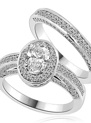 Wedding Set--1.0 ct. Oval cut Diamond Essence set in the center with melee around. Matching band with Melee. 2.50 cts.t.w. in Platinum Plated Sterling Silver.