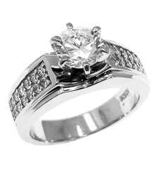 Diamond Essence Ring With 1 Ct. Round Brilliant Center and Sparkling Melee on The Band Enhance the look in Platinum Plated Sterling Silver,1.25 Cts.T.W.
