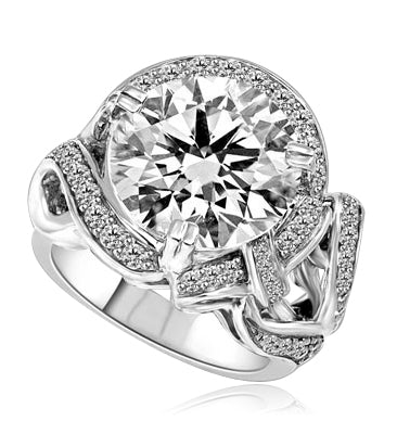 Outstanding - 8.5 Cts. Round Brilliant Diamond Essence shinning in center surrounded by Melee in curvy setting. Perfect for any Occasion!! 9.5 Cts. T.W. set in Platinum Plated Sterling Silver.