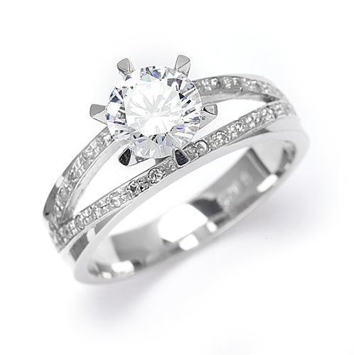 Diamond Essence Ring with 1.0ct. Round brilliant stone set in six prongs with two rows of round stones on each side, 2.10ct. tw. in Platinum Plated Sterling Silver.