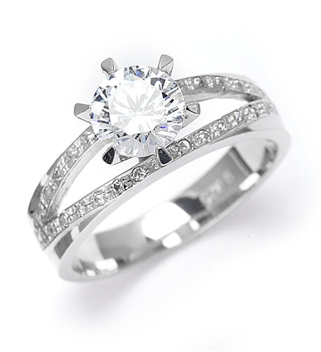 Diamond Essence Ring with 1.0ct. Round brilliant stone set in six prongs with two rows of round stones on each side, 2.10ct. tw. in Platinum Plated Sterling Silver.